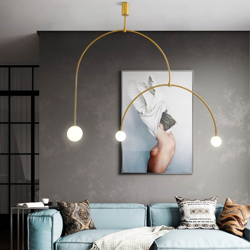 Modern black and gold glass ball LED pendant lights for living rooms, restaurants, and exhibition spaces