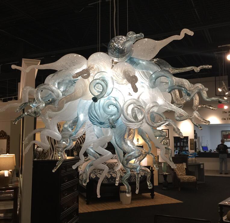 Modern blue blown glass chandeliers and flush mount lights for stylish indoor living spaces, bedrooms, and kitchens