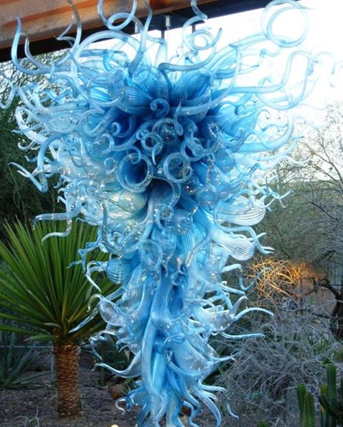 Modern blue glass chandeliers with hand-blown designs for home and hotel interiors