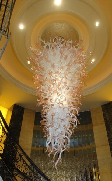 Modern crystal chandelier staircase lighting with Murano glass chain design for elegant foyer and living room decor
