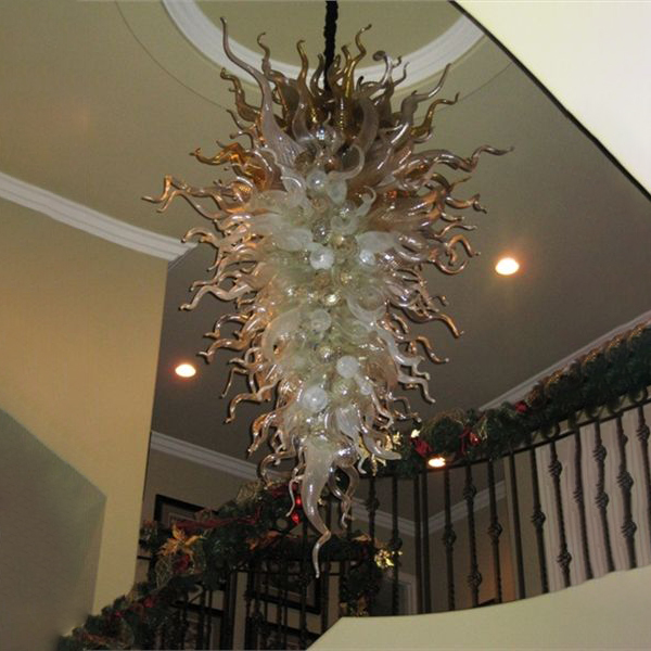 Modern crystal LED chandeliers featuring hand-blown glass in stylish pendant lamps for elegant living room decor with energy-saving lighting