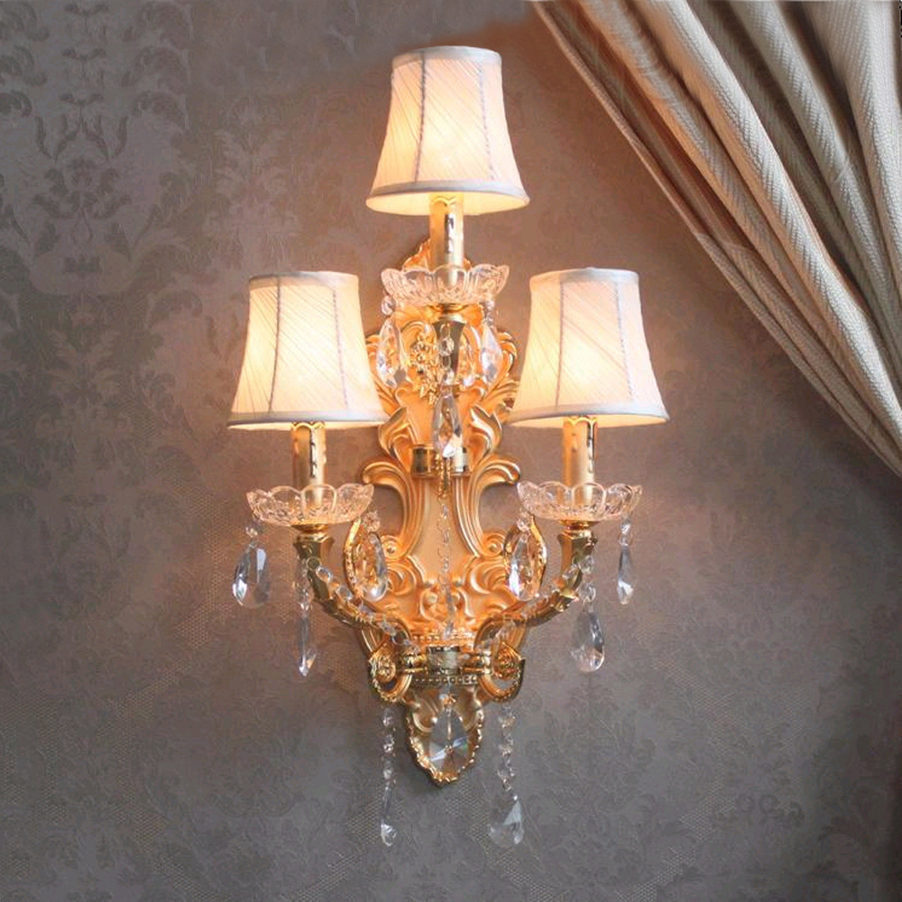 modern crystal wall lamp with gold finish and fabric shade for hotel, bathroom, bedroom, or sitting room in Nordic style
