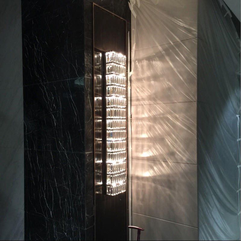 Modern crystal wall lamps featuring luxurious LED lighting in silver sconce design for living rooms, bedrooms, and hallways