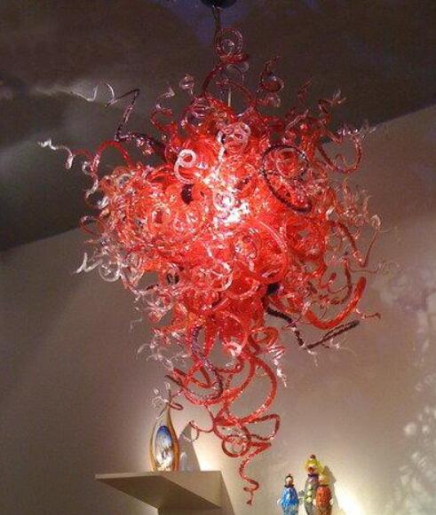 Modern designer LED pendant lamps featuring hand-blown glass suspensions, crafted in China