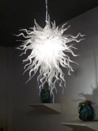 Modern elegant chandeliers featuring handcrafted glass and crystal designs with LED lighting