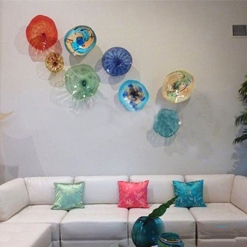Modern floral wall plates in vibrant Tiffany-style blown glass, perfect for living and dining room decor