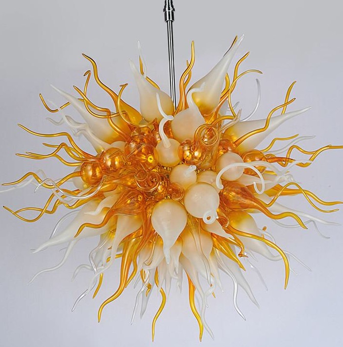 Modern gold chandeliers for home interiors featuring energy-efficient lighting and handcrafted glass art designs