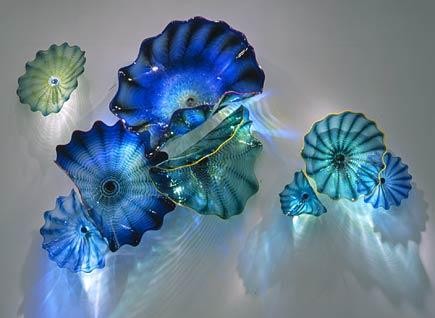 Modern handcrafted colored Murano glass lamps and plates in Mediterranean style, ideal for wall decor in hotels and homes