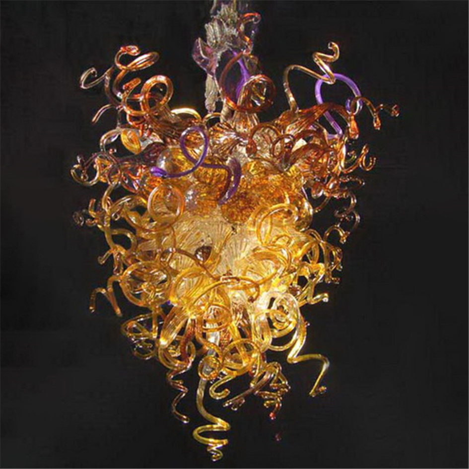 Modern handcrafted glass chandelier with gold accents for living spaces and hospitality venues