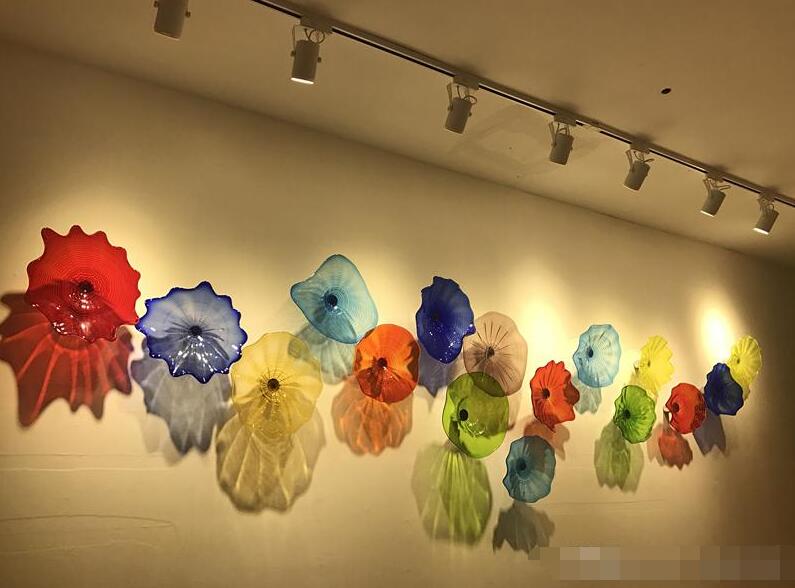 Modern handcrafted Murano glass floral plates for wall decor in customizable hues and dimensions