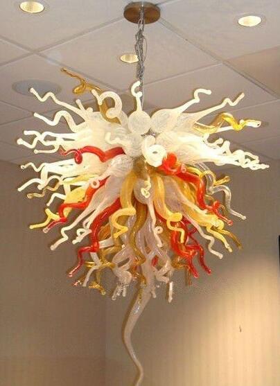 Modern indoor LED chandelier featuring handcrafted European-style glass shades with crystal accents