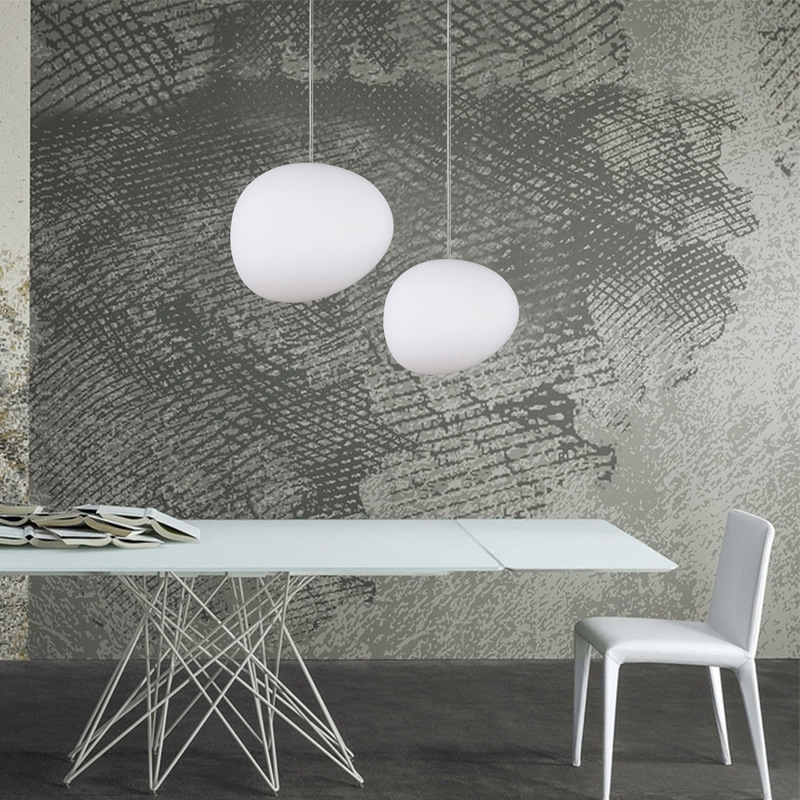 Modern Italian Foscarini Gregg LED pendant light with irregular design for dining and kitchen spaces
