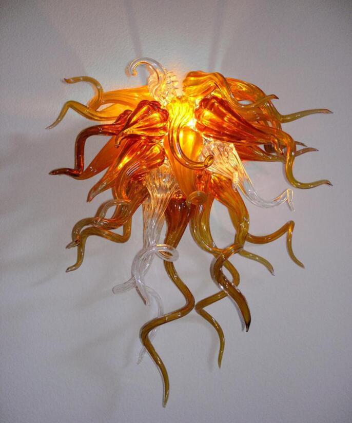 Modern Italian wall sconces featuring hand-blown colored glass and integrated LED lighting