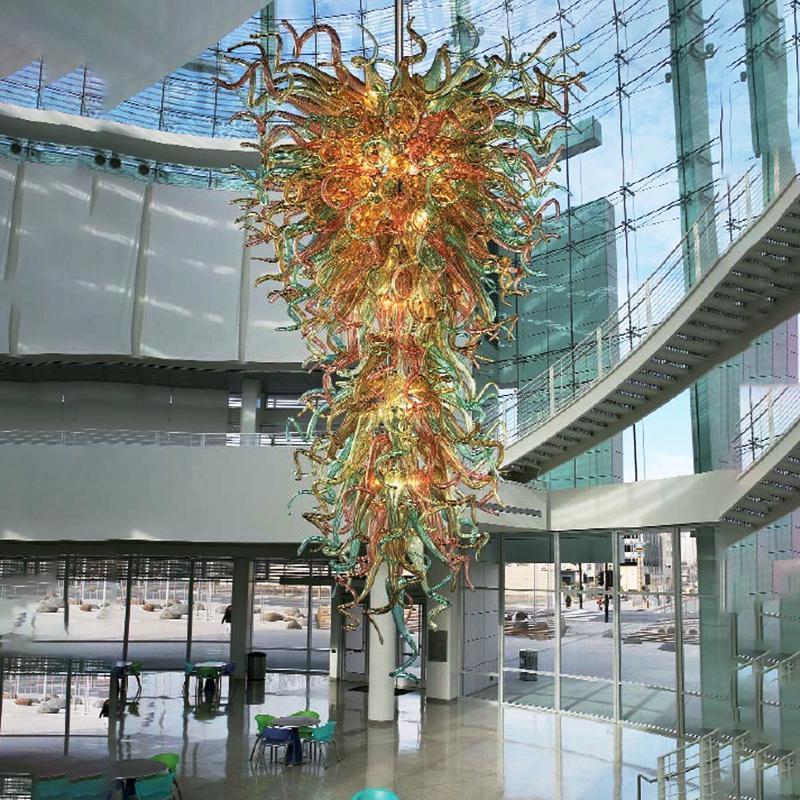 Modern LED chandelier featuring Murano glass, ideal for living and dining rooms, duplexes, or staircases, with adjustable rotation and a sleek hanging design