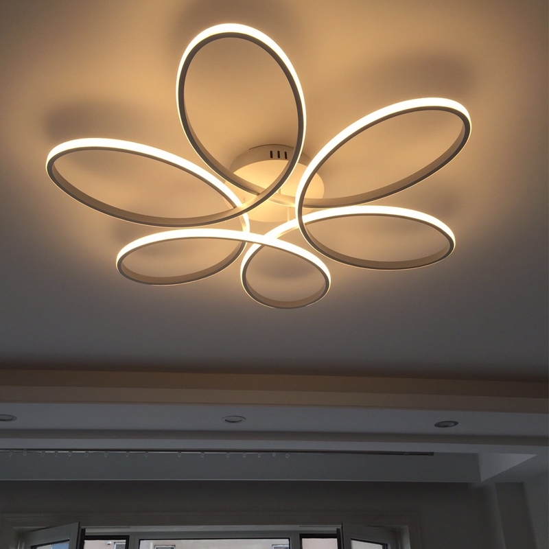 Modern LED chandelier with remote control for stylish indoor ceiling lighting in black home decor
