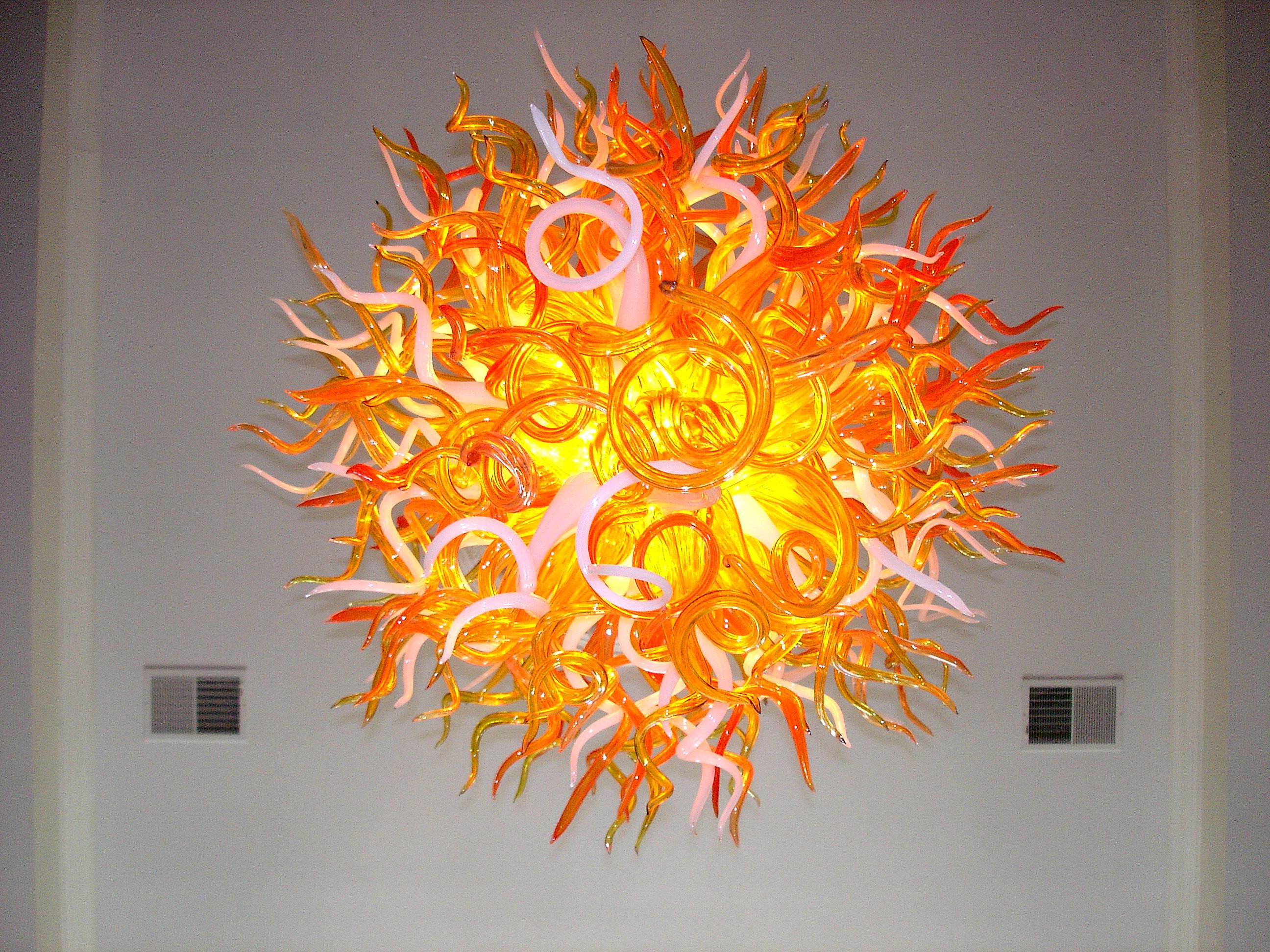 Modern LED chandeliers with handcrafted colored glass shades in round designs for customized lighting