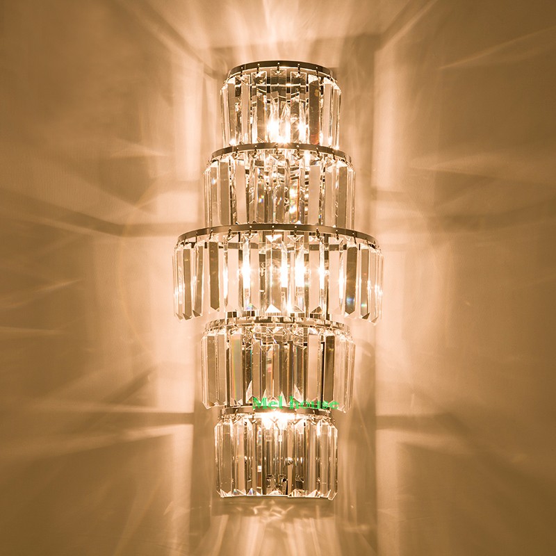 Modern LED crystal wall sconce in black for stylish indoor lighting in living rooms, bedrooms, and bathrooms