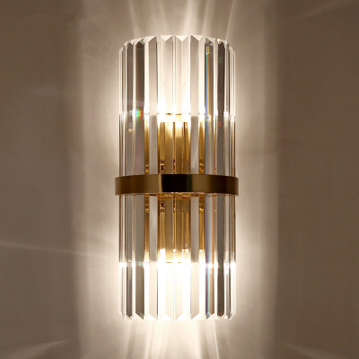Modern LED crystal wall sconce with gold finish for stylish home decor in bedrooms and hallways