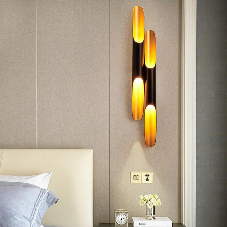 Modern LED wall lamp with dual aluminum tube wings in black and gold, Nordic-style for living room or bathroom mirror lighting