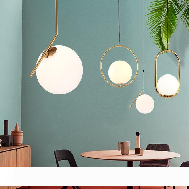 Modern minimalist pendant lamp featuring a Nordic-style glass ball design, perfect for living rooms, bedrooms, and dining areas