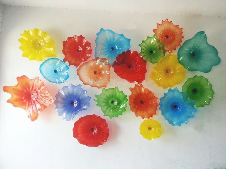 Modern multicolored Murano glass plate lamp with scalloped edges and floral wall art design, a stylish decorative lighting piece