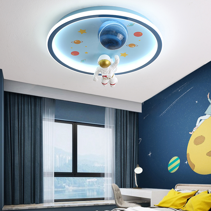 Modern Nordic ceiling light featuring a playful spaceman and planet design, perfect for boys' bedrooms with LED eye protection