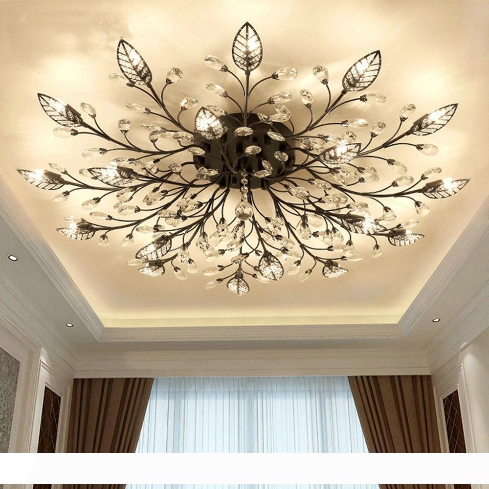 Modern Nordic chandelier with K9 crystal and LED lighting in gold and black, ideal for living spaces, bedrooms, kitchens, and bathrooms