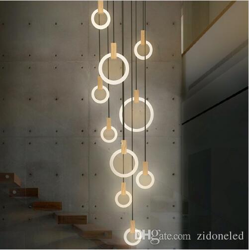 Modern Nordic LED chandelier with acrylic ring design for indoor stair lighting, available in 3/5/6/7/10 ring configurations