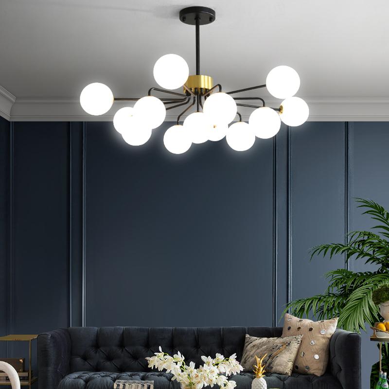 Modern Nordic-style pendant lamp with glass ball shade and gold/chrome finish, suitable for living room lighting