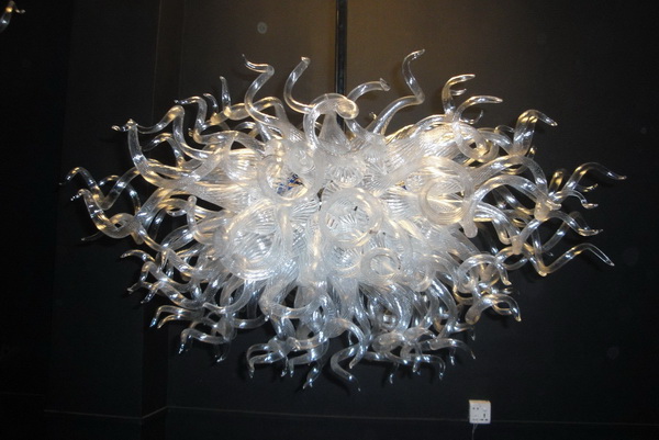Modern pendant lamp featuring handcrafted Murano-style glass shade with integrated LED lighting for elegant indoor illumination