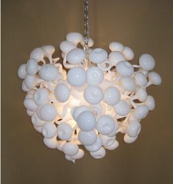 Modern pendant lights featuring handcrafted Murano glass in a white mushroom design with LED bulbs for elegant chandelier lighting