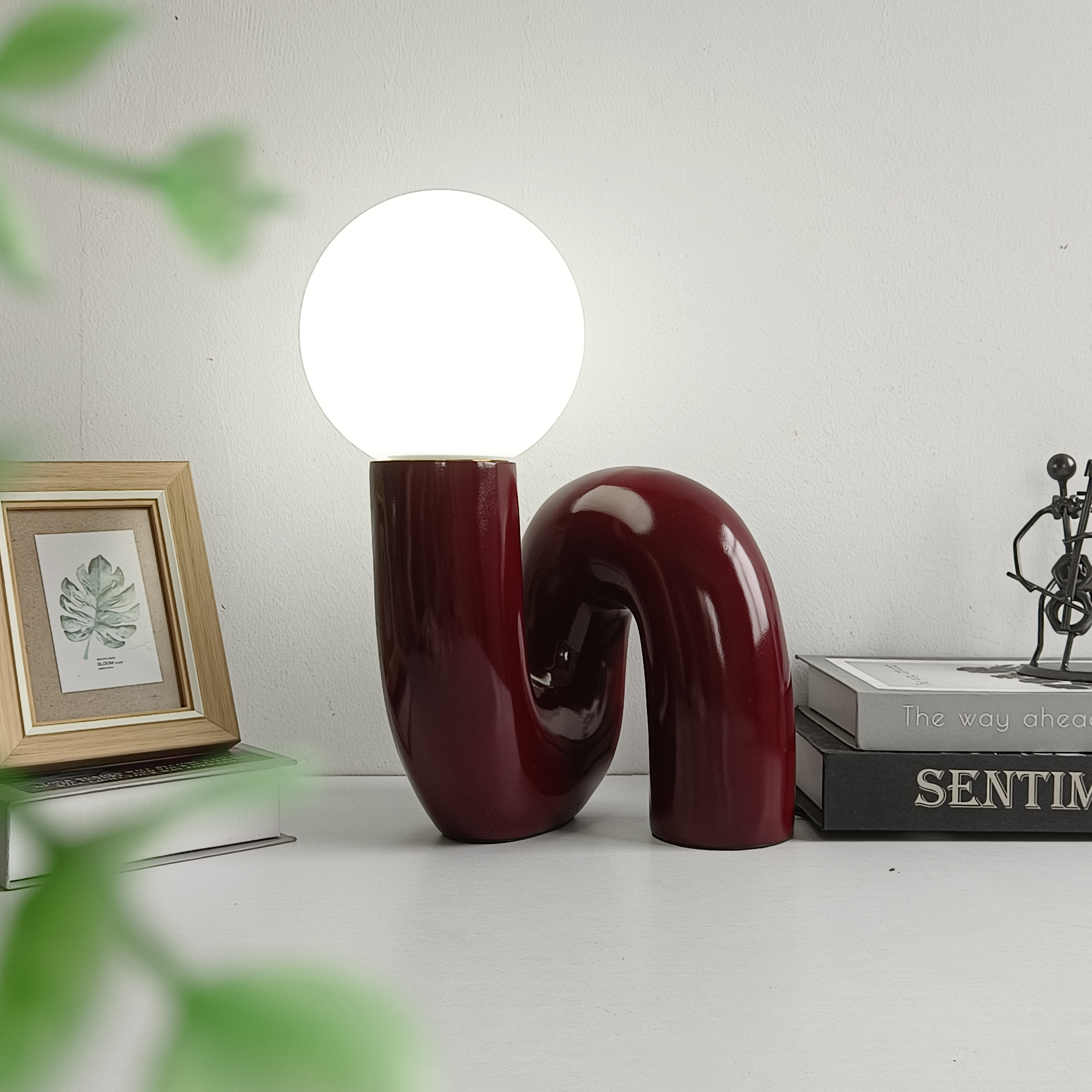 Modern red LED table lamps with resin glass spheres, perfect for Nordic-style bedrooms