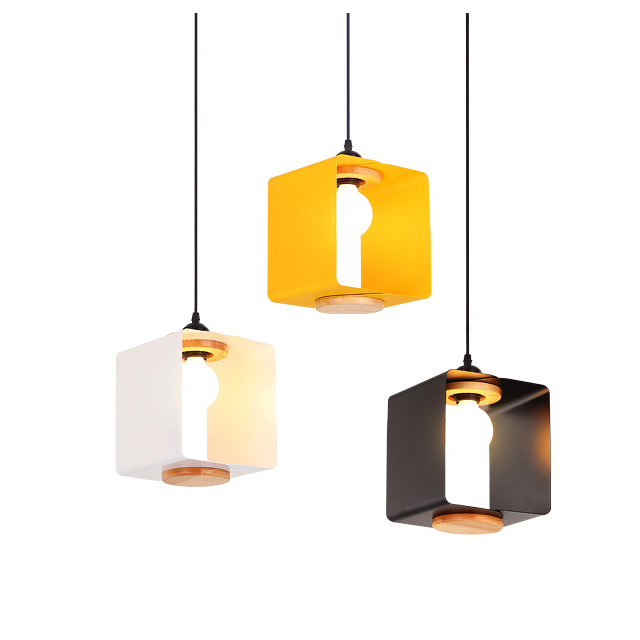 Modern simple metal pendant lights in colorful macaron shades, featuring black, white, blue, and yellow hues, perfect for kids' rooms, bedrooms, or restaurants