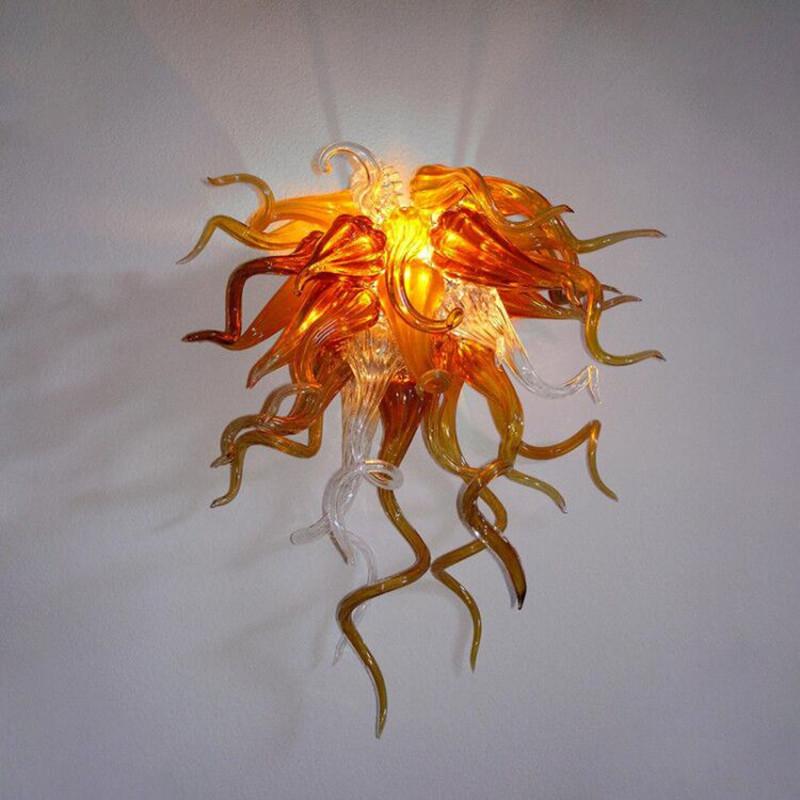 Modern vintage-style wall sconces featuring handcrafted Italian glass with LED illumination