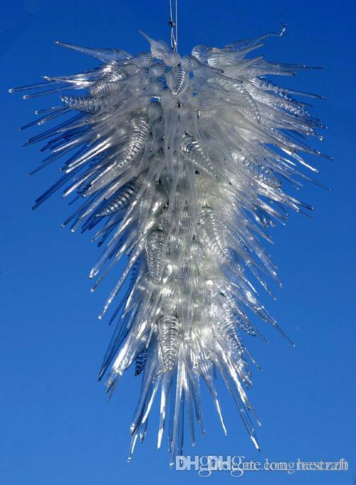 Modern white Murano glass chandelier with crystal accents, inspired by Dubai's luxury staircase lighting