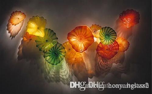 Mouth-blown Murano glass plates in vibrant colors, modern handcrafted wall decor pieces