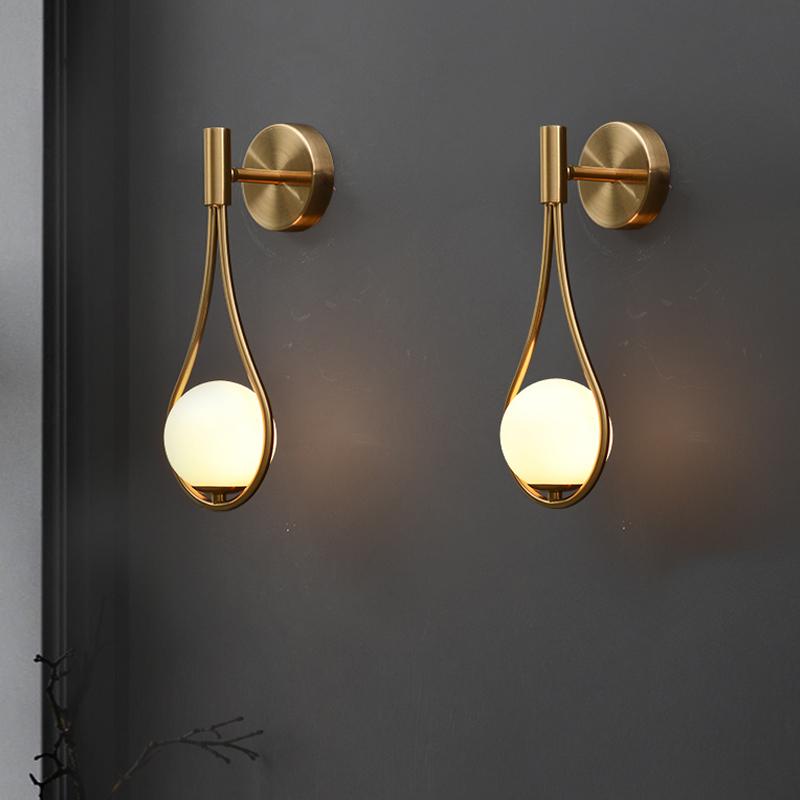 Nordic black and gold LED wall lamps with white glass shades for modern bedrooms, restaurants, and bathrooms