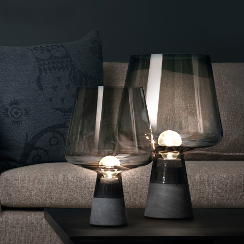 Nordic minimalist cement bedside lamp with glass tabletop for creative study spaces