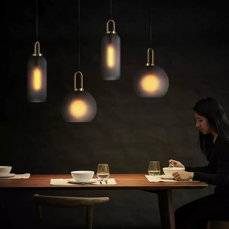 Nordic modern minimalist E27 glass ball LED pendant lights for stylish interior lighting in restaurants, bedrooms, and staircases