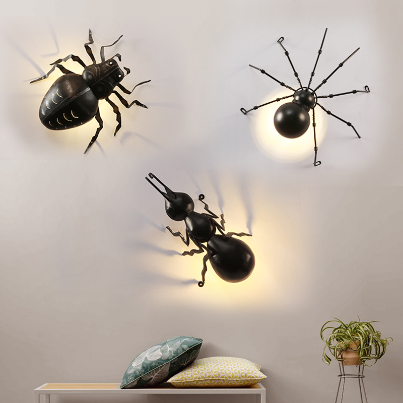 Nordic-inspired insect-shaped wall lamps featuring beetles, spiders, and ants for creative children's room decor or bar lighting