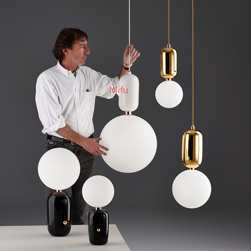 Nordic-inspired pendant lamp with a sleek modern design, ideal for restaurants, bars, kitchens, bedrooms, or bedside lighting, featuring a stylish glass ball hanging light