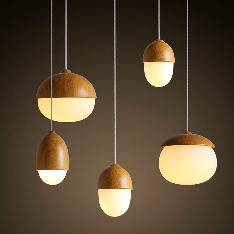 Nordic-style pendant light with wood grain glass and E27 socket, featuring a mushroom-shaped design