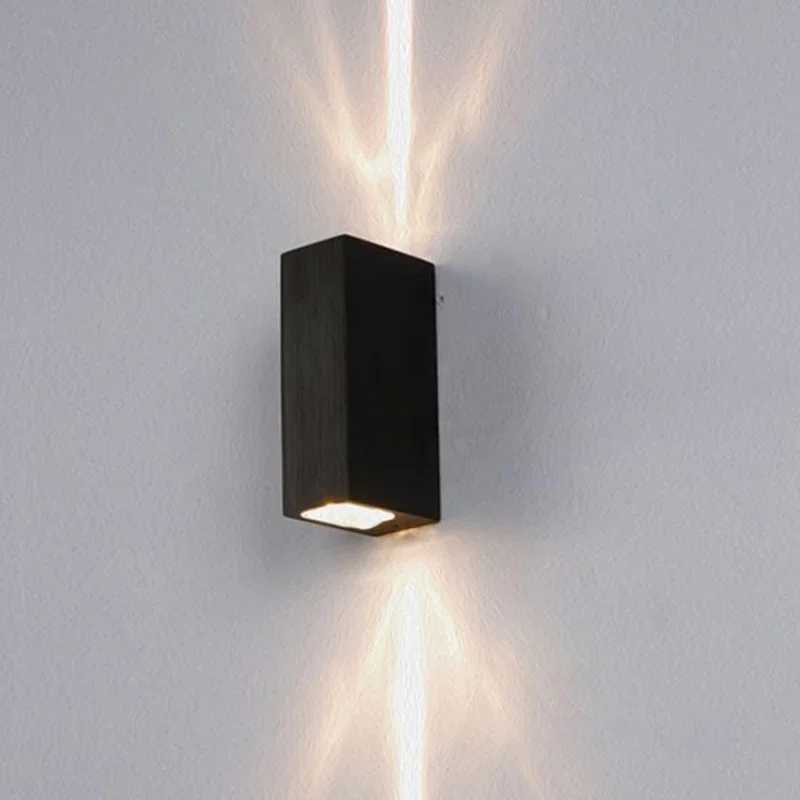 Outdoor wall-mounted LED lamps with dual heads for porch, corridor, and staircase lighting, featuring waterproof design and adjustable beam angles