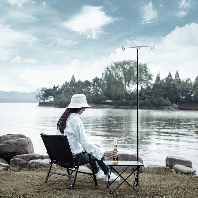Portable folding pole with ground stake for freestanding camping lanterns, made of lightweight aluminum alloy
