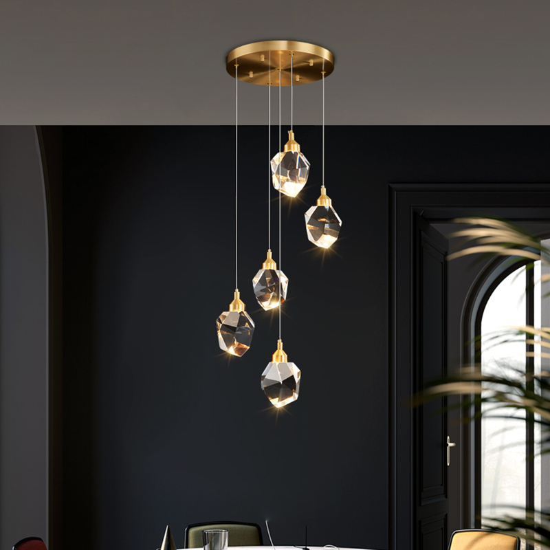 Postmodern crystal pendant lamp for elegant bedrooms and dining rooms, featuring a long hanging design with luxurious glass accents in a Nordic-inspired chandelier style