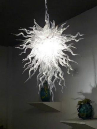 Pure white handcrafted glass lamp resembling a crystal chandelier floor light