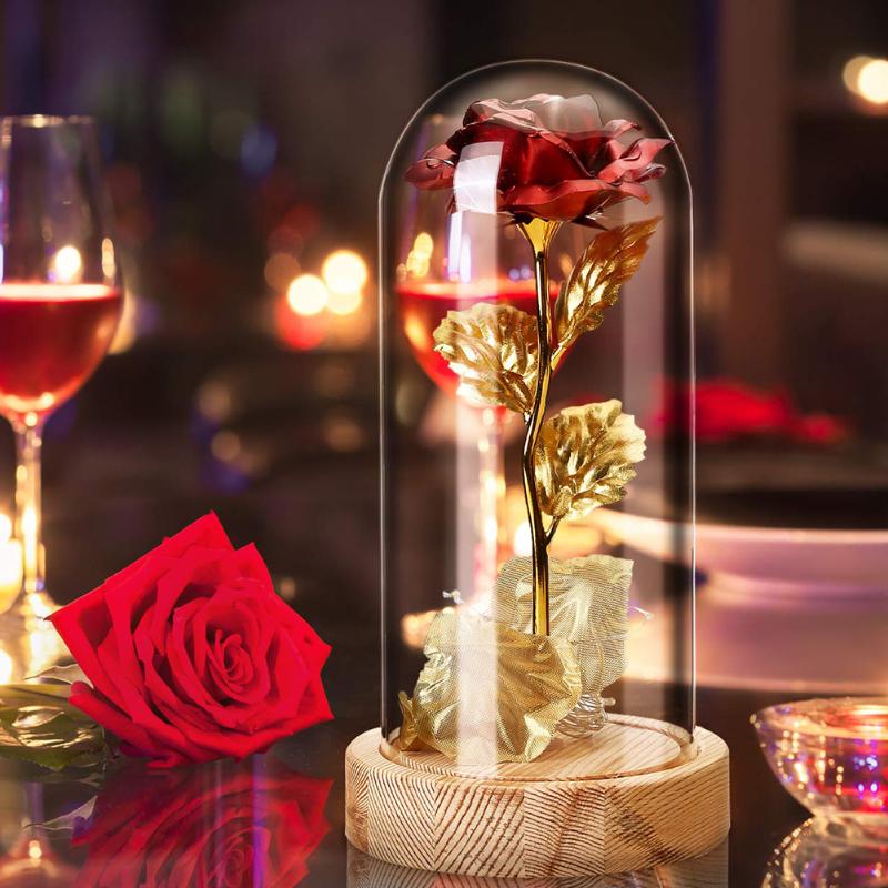Red rose LED glass candle holder with a straight cylindrical transparent shade measuring 22x11.4cm