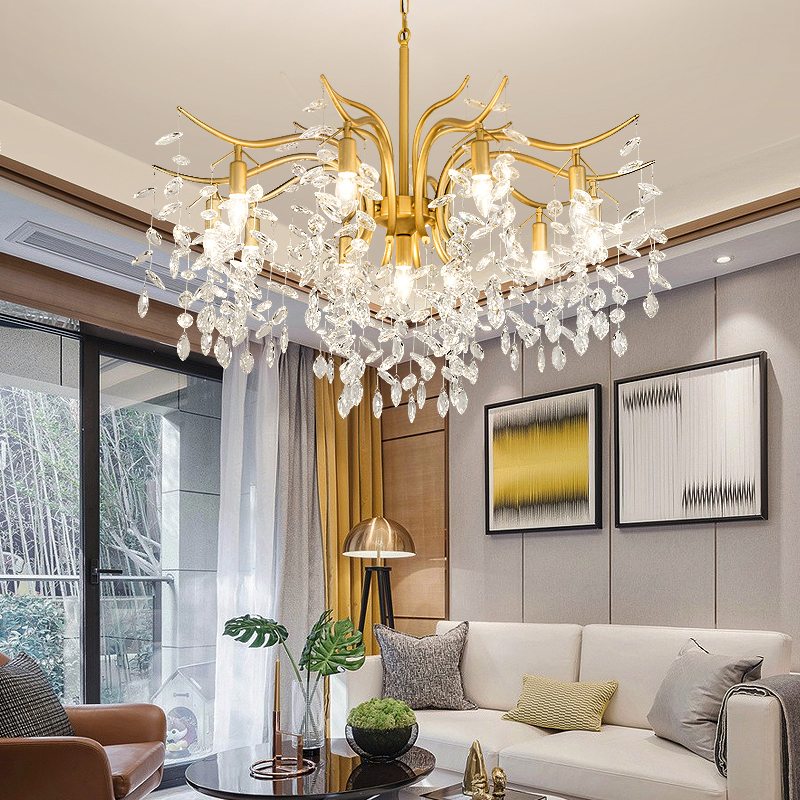 Restaurant chandelier with gold and black metal frame, featuring hanging crystal suspension lamp