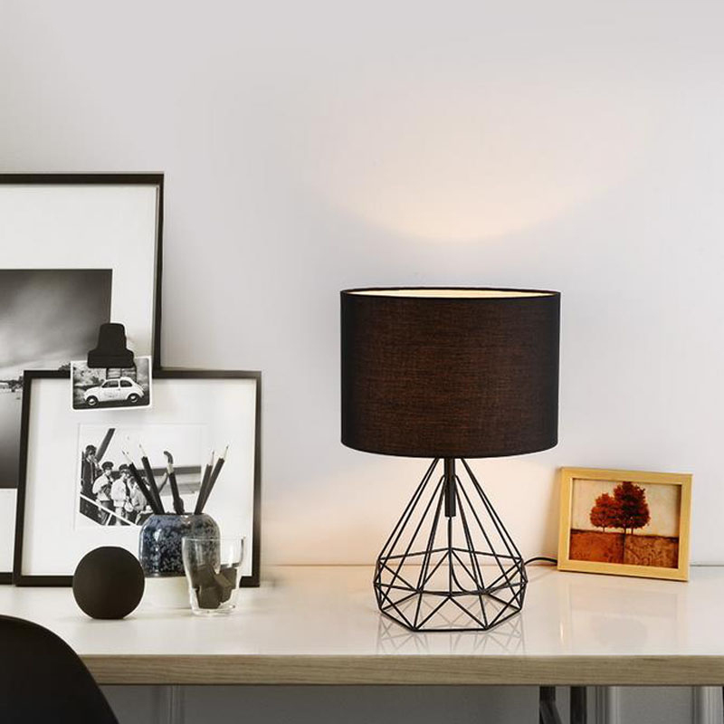 Retro geometric desk lamp featuring gold, black, and white hollow diamond design with cloth shade, perfect for bedroom decor or as a stylish table light fixture