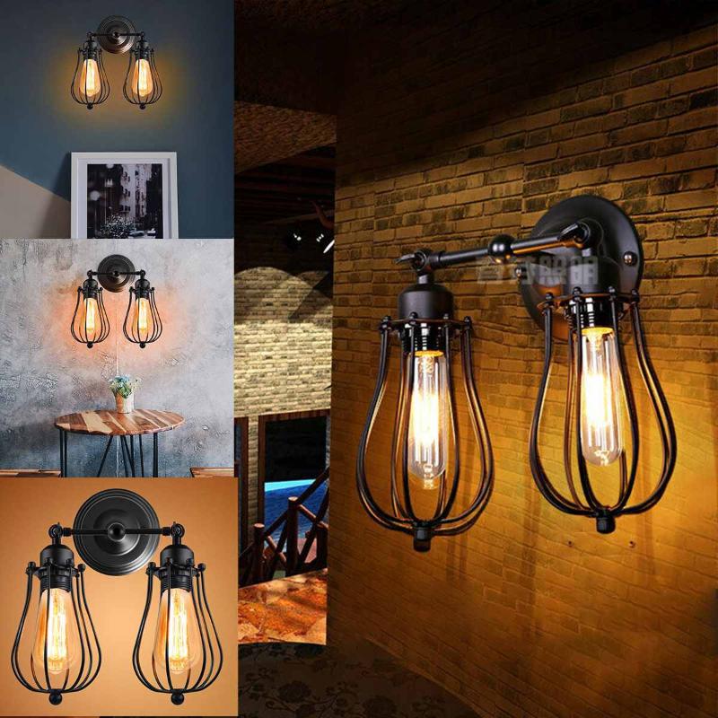 Retro industrial-style double-headed wall sconce with vintage lamp shades, featuring rustic wrought iron construction and LED lighting, ideal for antique restaurant or corridor decor